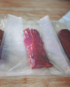 Custom size heat sealed PA PE chamber vacuum pouch clear plastic bag frozen food vacuum packaging bag for fresh meat